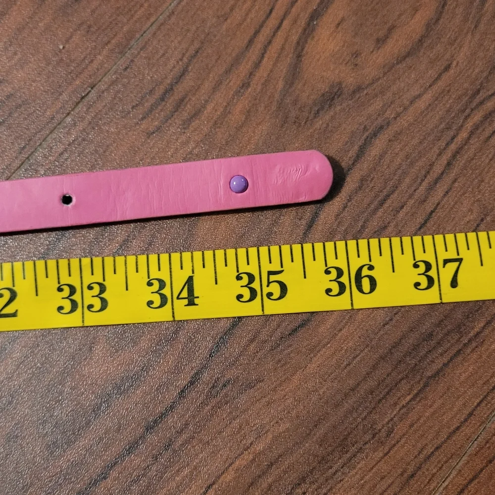 Pink, purple, and blue kids belt size xl
